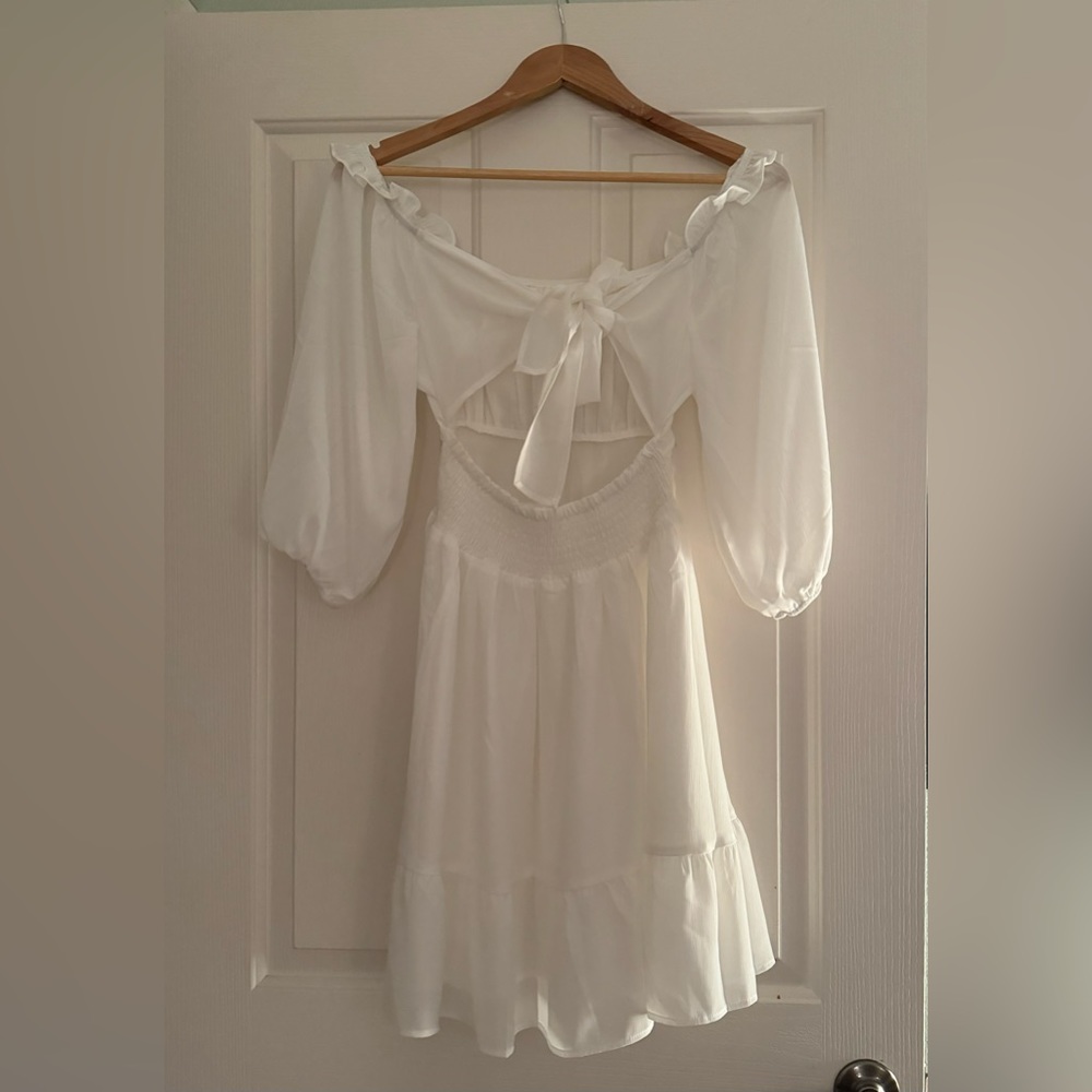 Women’s tie back summer dress.  New never worn.